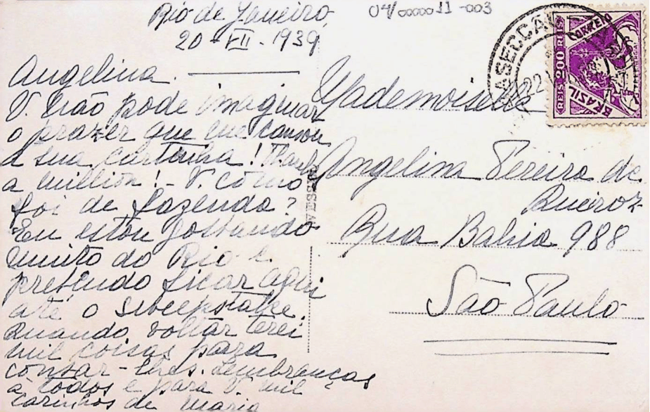 Verso de cartão-postal com mensagem manuscrita e selo.